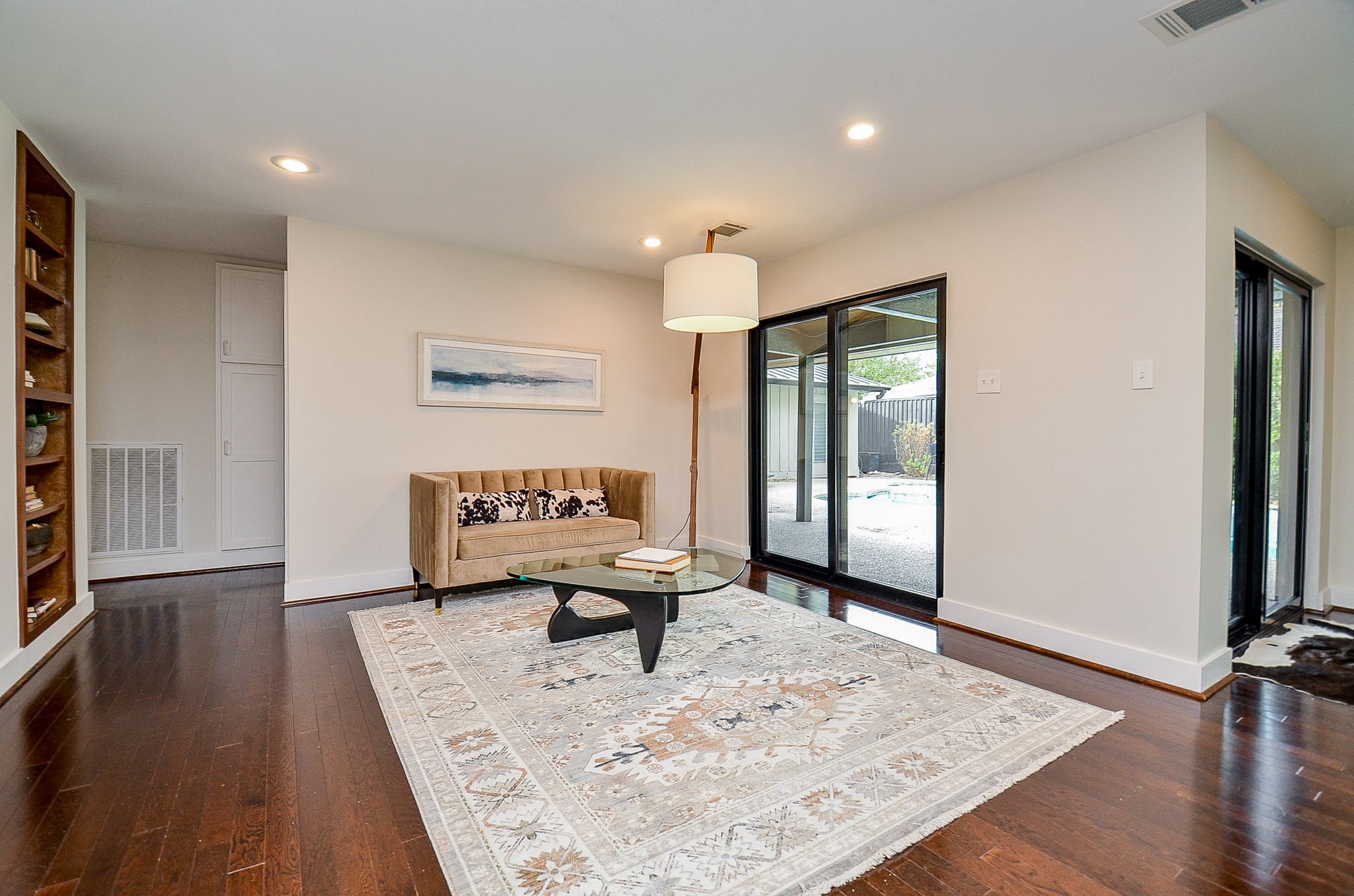 10003 Burgoyne Road Houston, TX 77042 - Photo 18 of 48 a living room with furniture and a rug