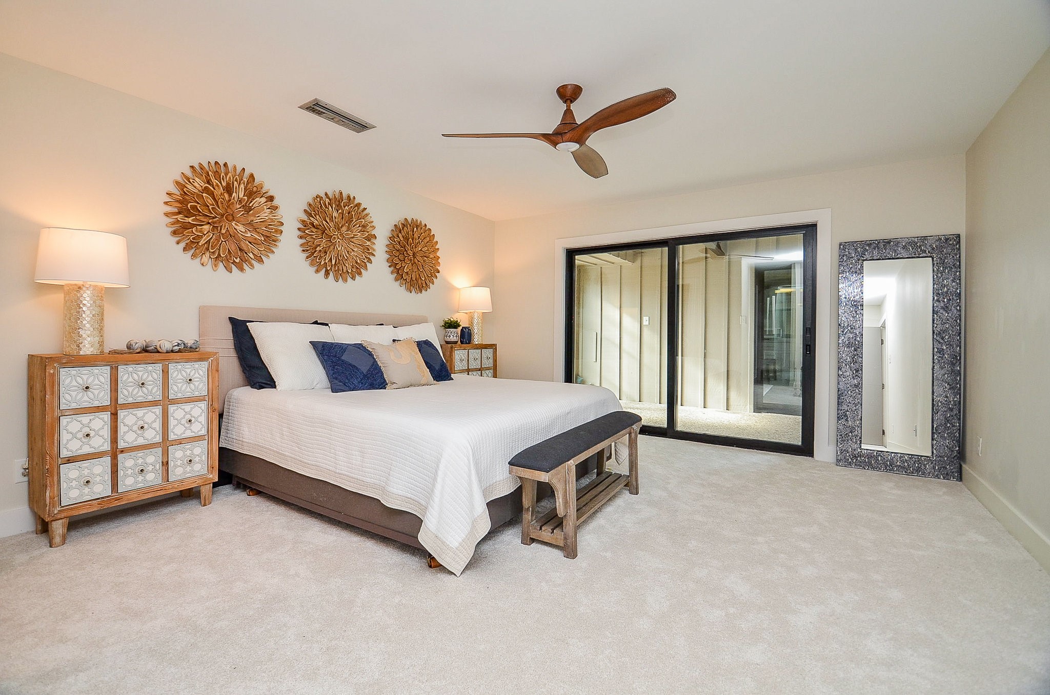 10003 Burgoyne Road Houston, TX 77042 - Photo 21 of 48 a spacious bedroom with a bed and a painting on the wall