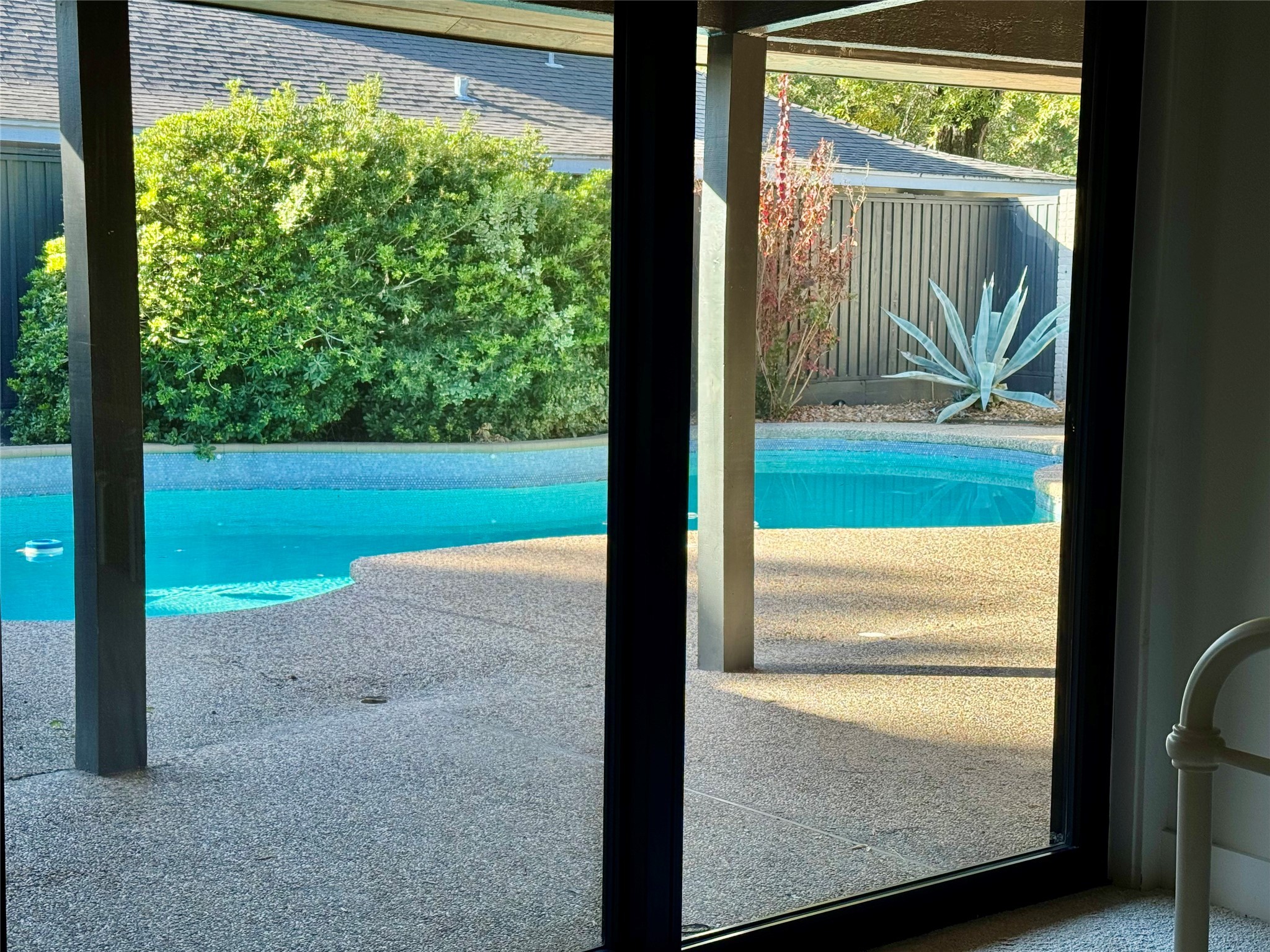 10003 Burgoyne Road Houston, TX 77042 - Photo 28 of 48 a view of porch with a yard