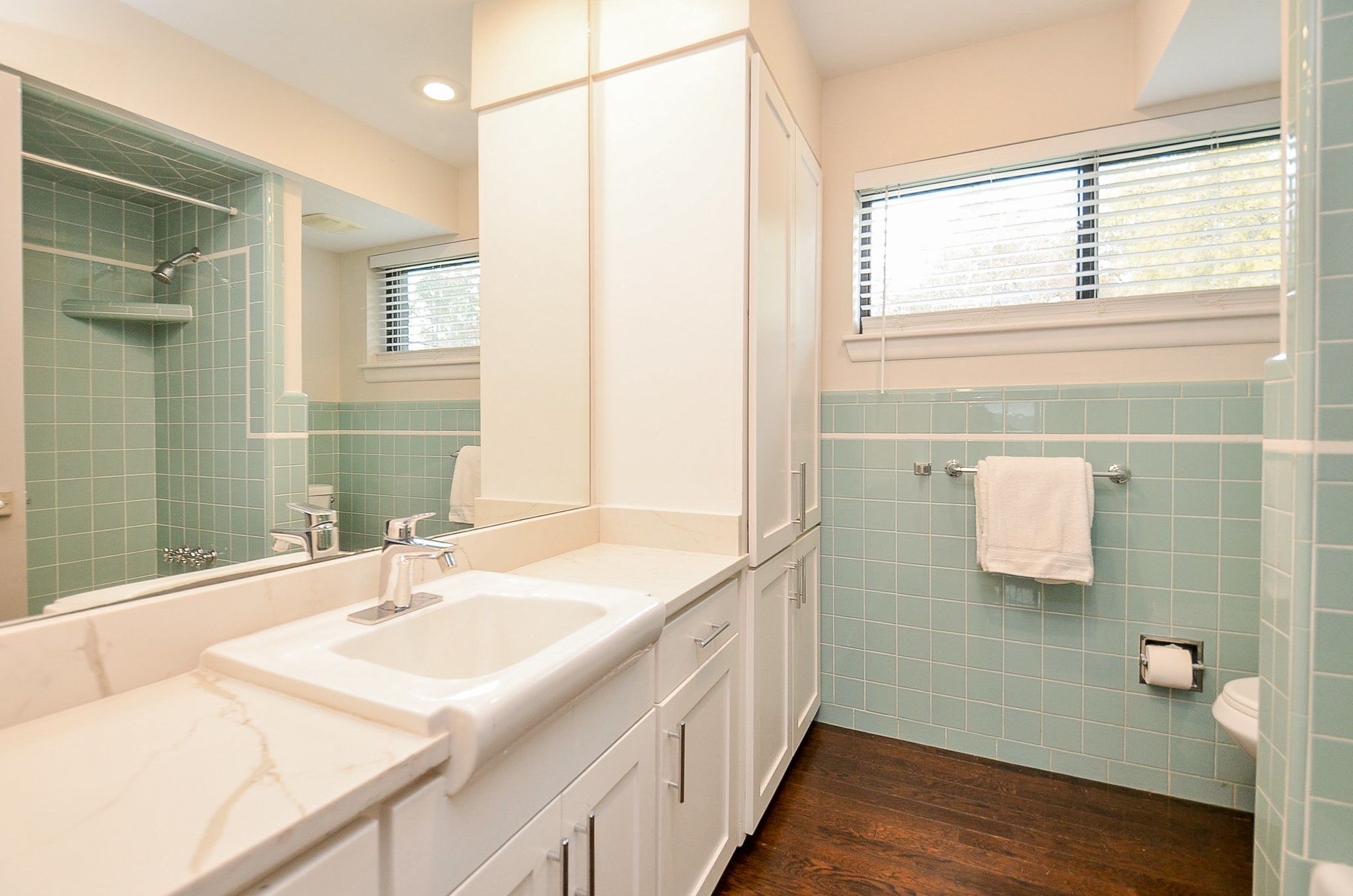 10003 Burgoyne Road Houston, TX 77042 - Photo 29 of 48 a bathroom with a sink and a mirror