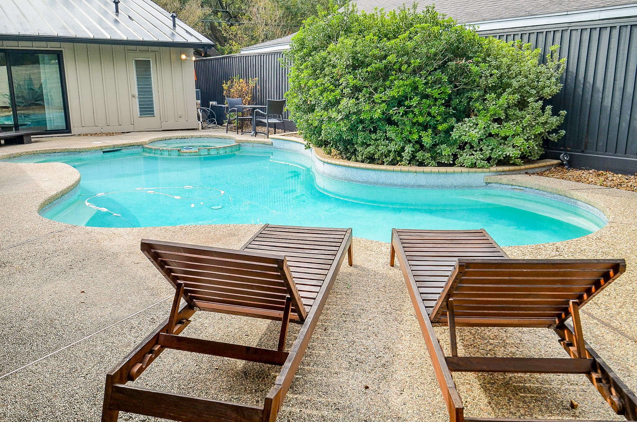 10003 Burgoyne Road Houston, TX 77042 - Photo 33 of 48 swimming pool view with a seating space