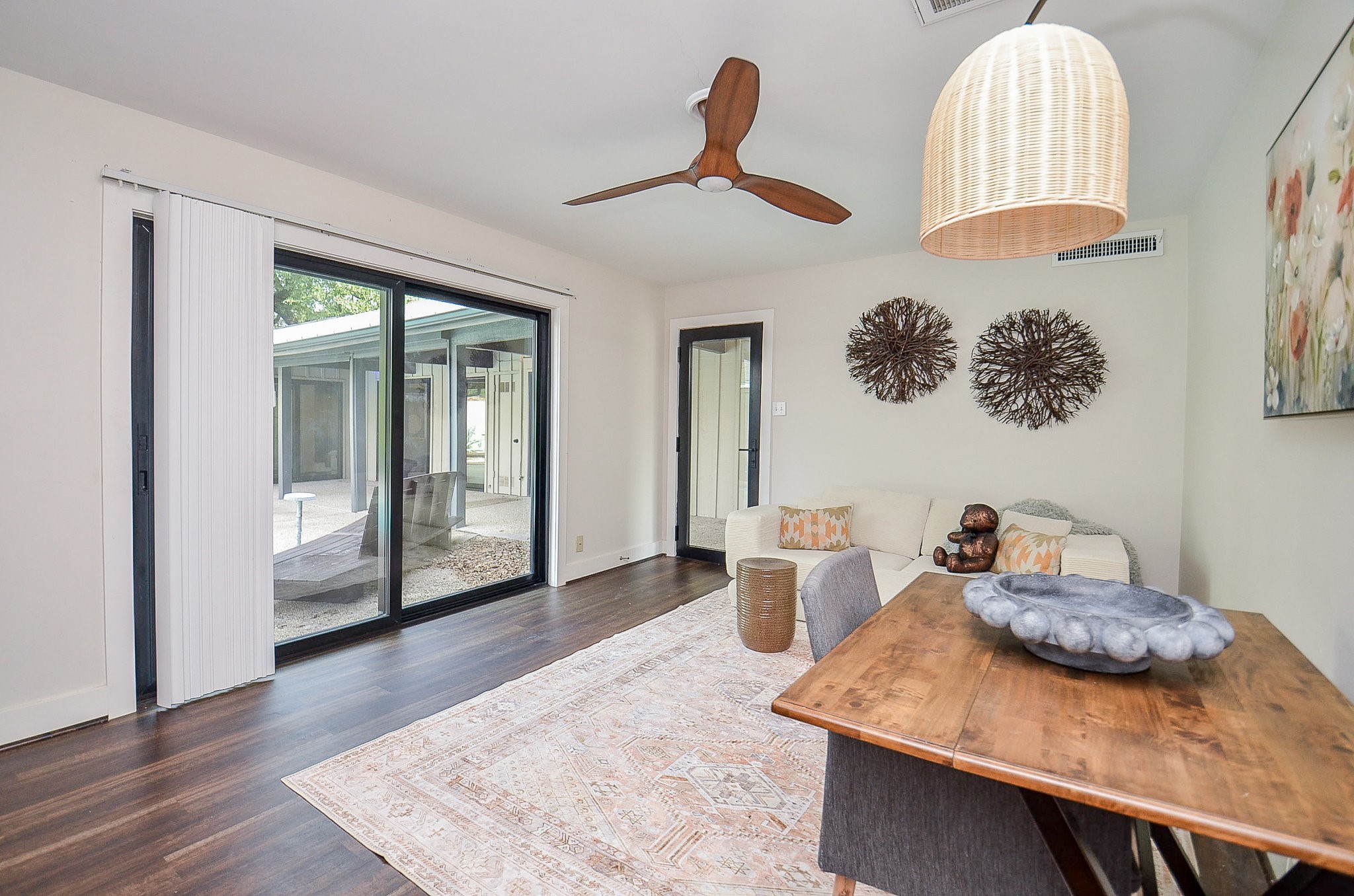 10003 Burgoyne Road Houston, TX 77042 - Photo 34 of 48 Fourth bedroom currently used as a guest suite with a sofa bed. Door leads to loggia and is across from primary suite