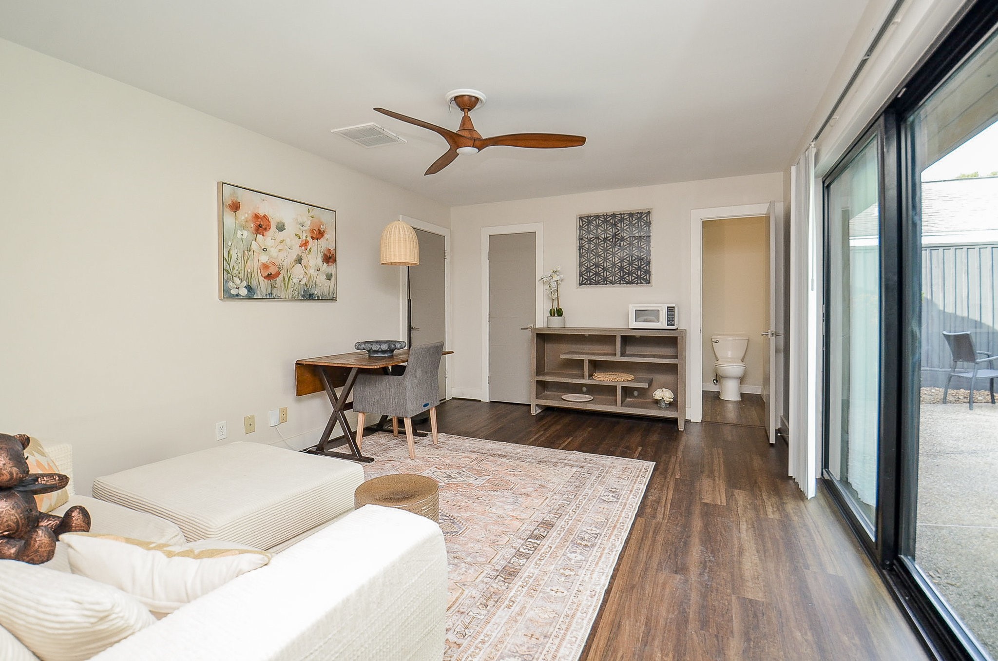 10003 Burgoyne Road Houston, TX 77042 - Photo 36 of 48 a living room with furniture and a chandelier