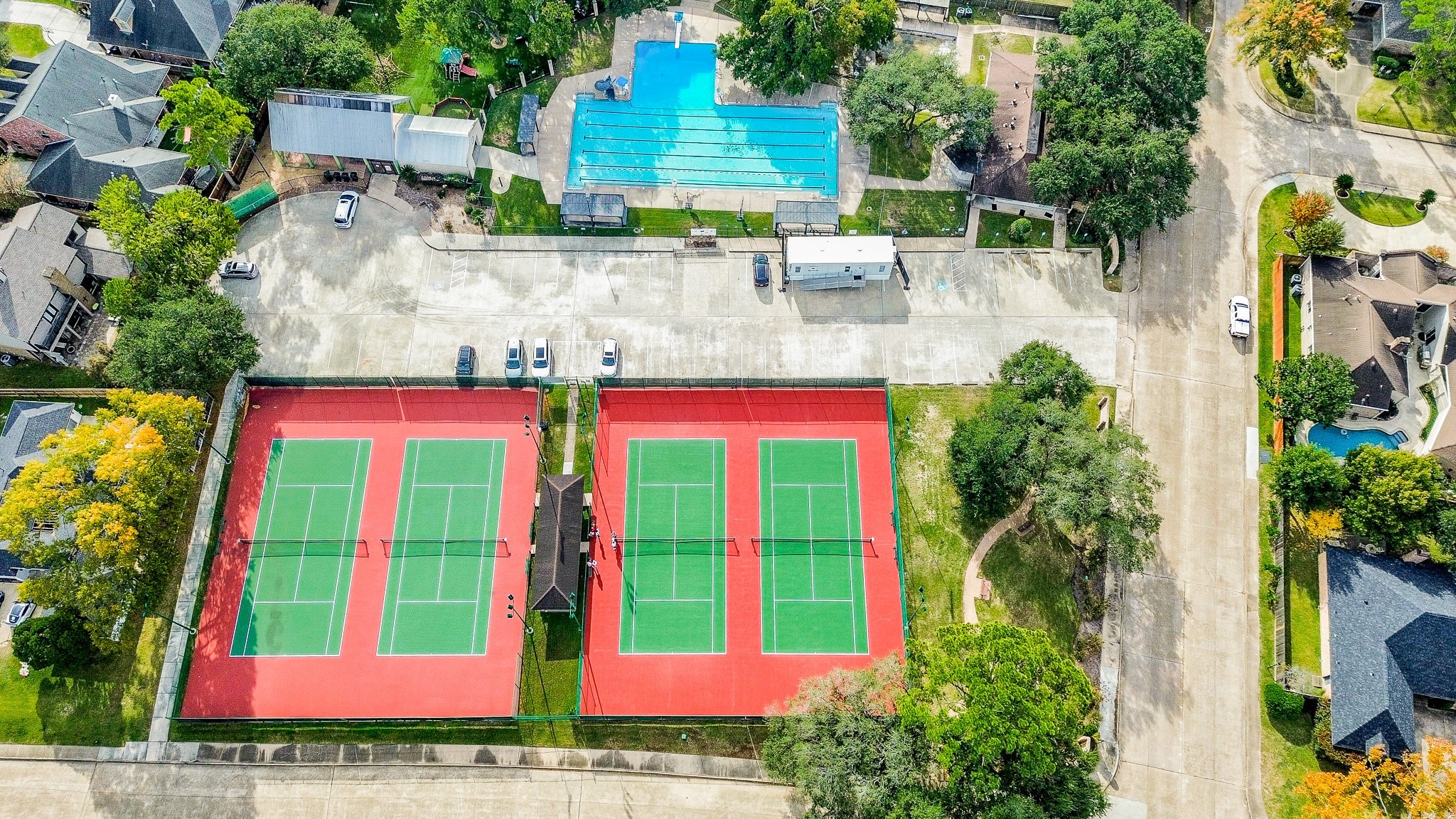10003 Burgoyne Road Houston, TX 77042 - Photo 43 of 48 a view of swimming pool with a patio