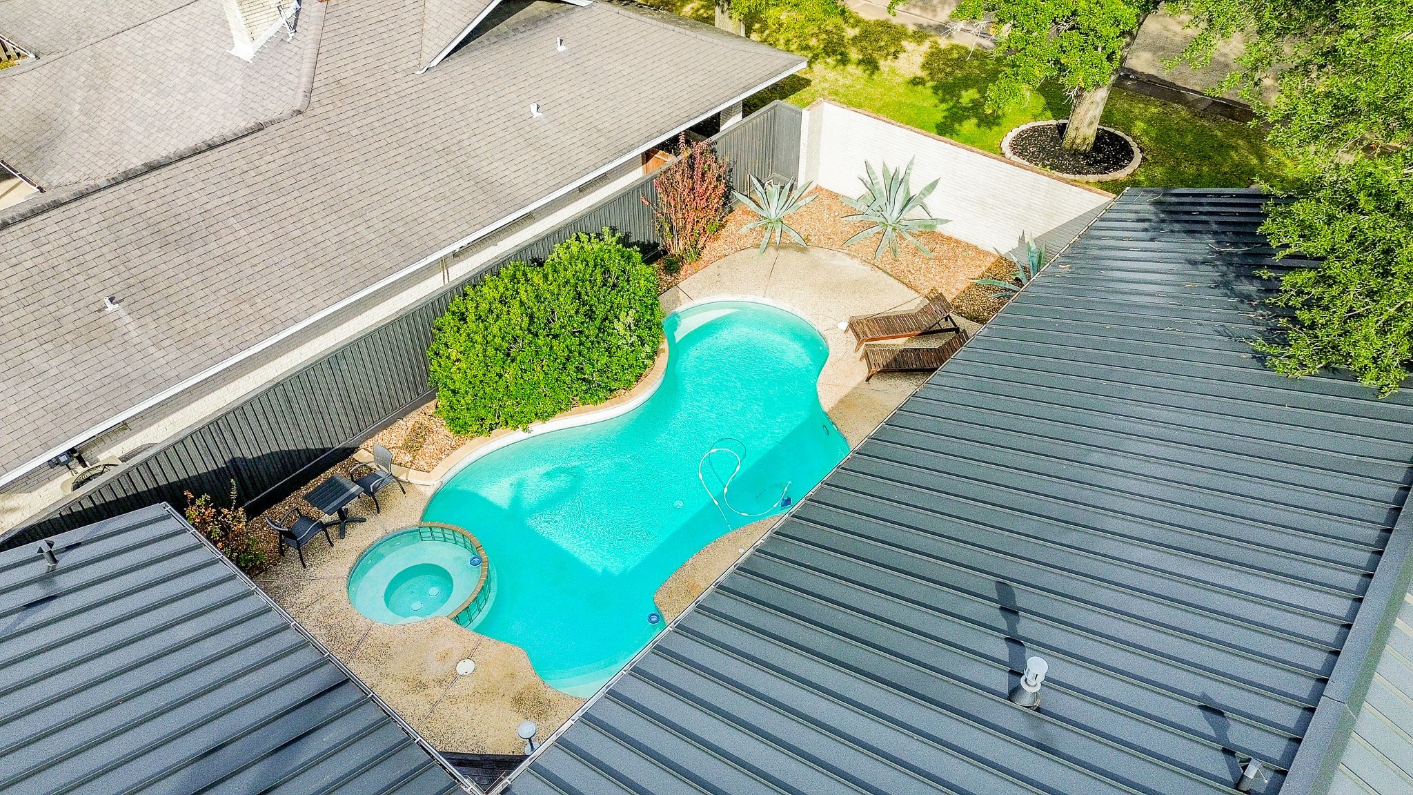 10003 Burgoyne Road Houston, TX 77042 - Photo 4 of 48 a view of a balcony with wooden floor