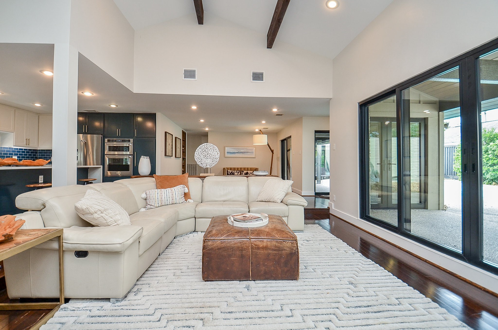 10003 Burgoyne Road Houston, TX 77042 - Photo 5 of 48 a living room with furniture and a large window