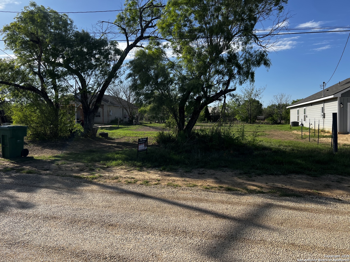 Willow St Willow Jourdanton, TX 78026 - Photo 7 of 7 a view of a yard with plants and a tree