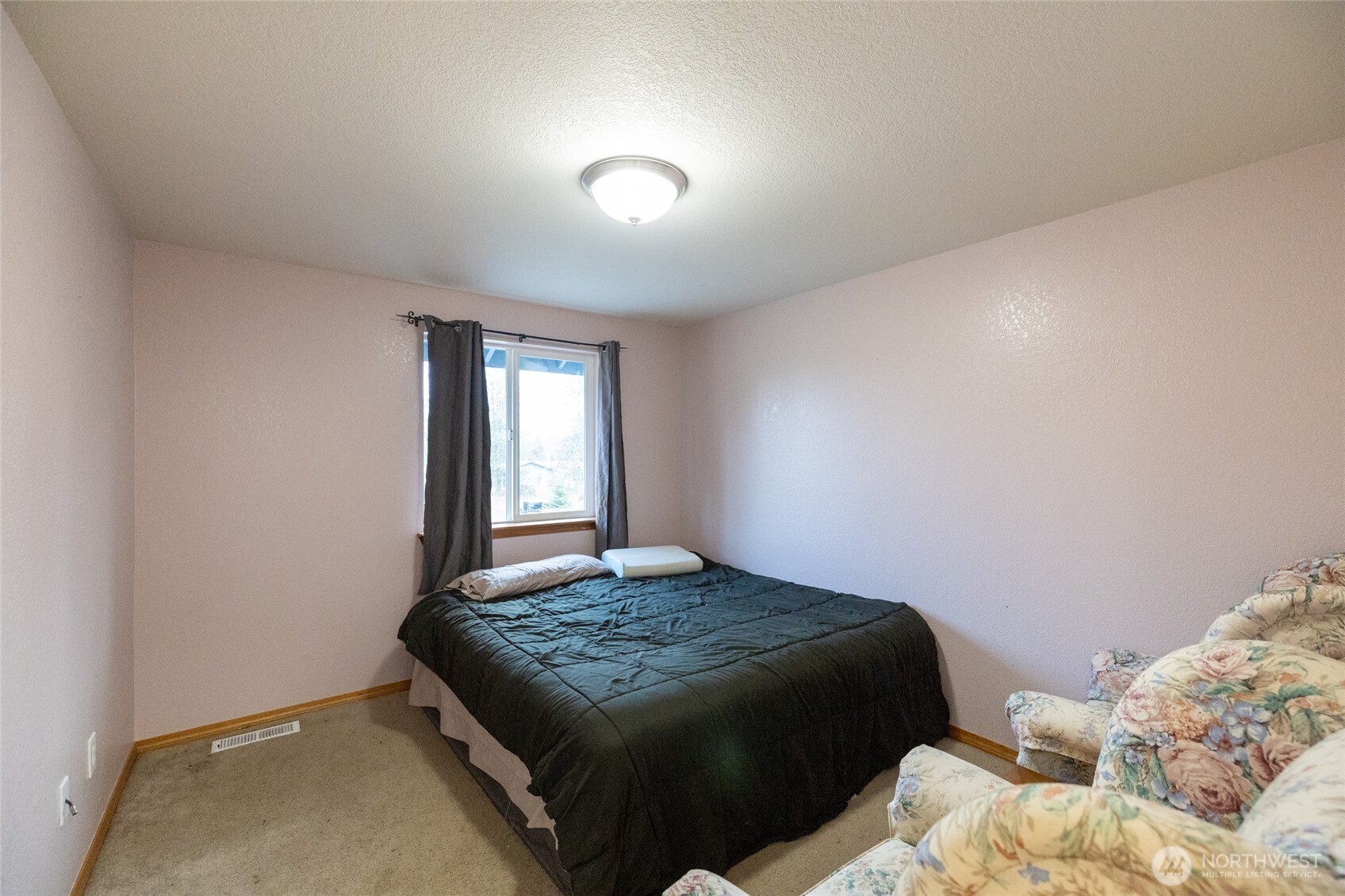 7332 183rd Avenue Southwest Rochester, WA 98579 - Photo 19 of 40 a bedroom with a bed and window