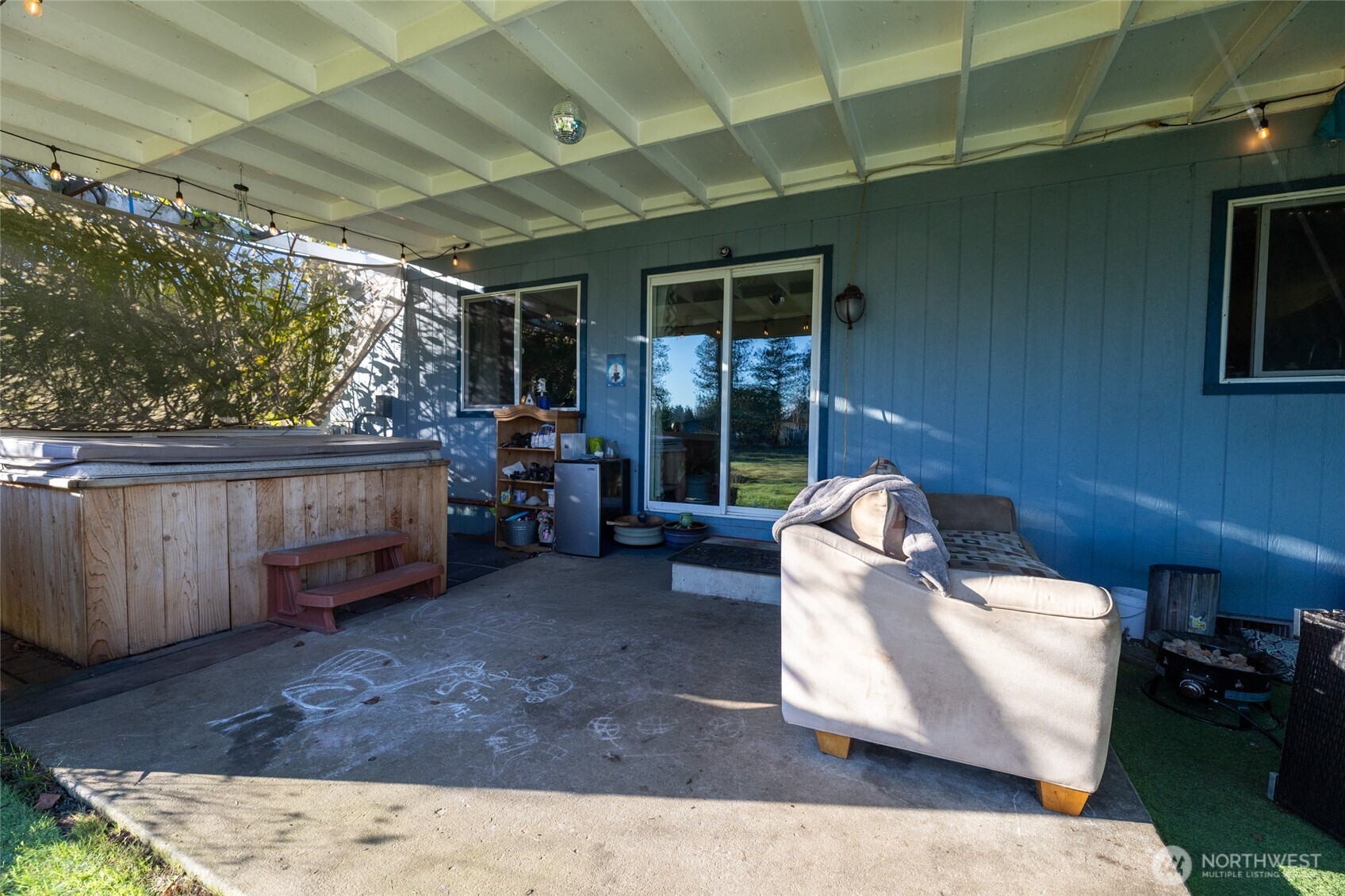 7332 183rd Avenue Southwest Rochester, WA 98579 - Photo 24 of 40 a view of a couches in patio of the house