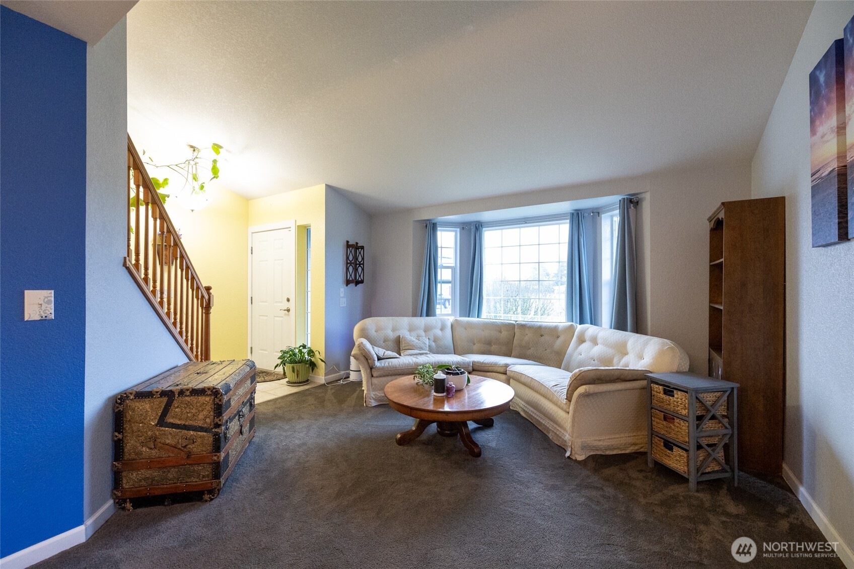 7332 183rd Avenue Southwest Rochester, WA 98579 - Photo 7 of 40 a living room with furniture a rug and a window