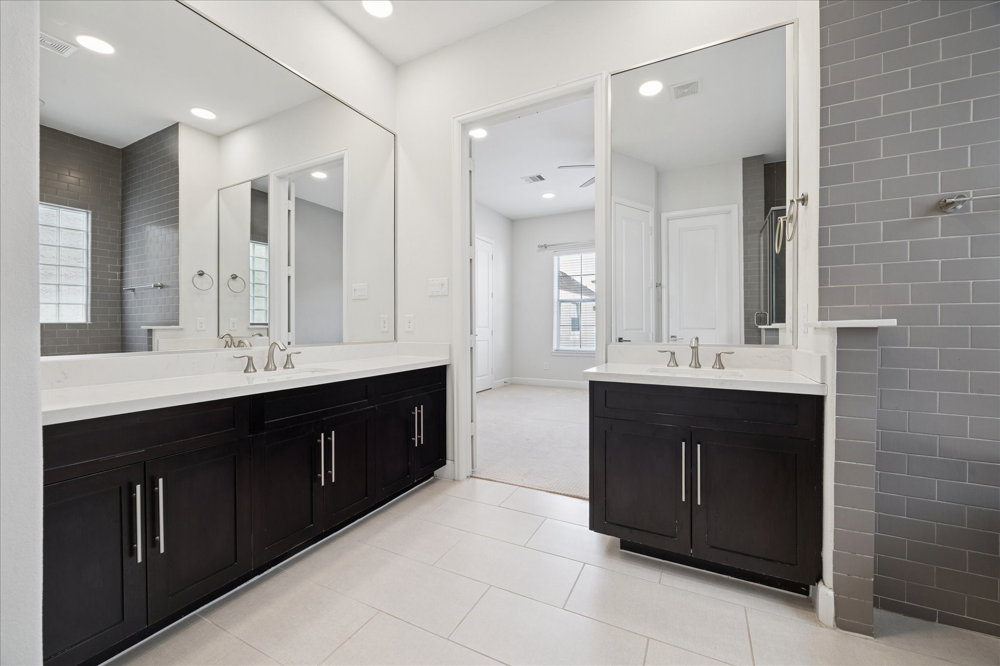 405 North Nagle Street, Unit B Houston, TX 77003 - Photo 11 of 24 a bathroom with a double vanity sink mirror and double