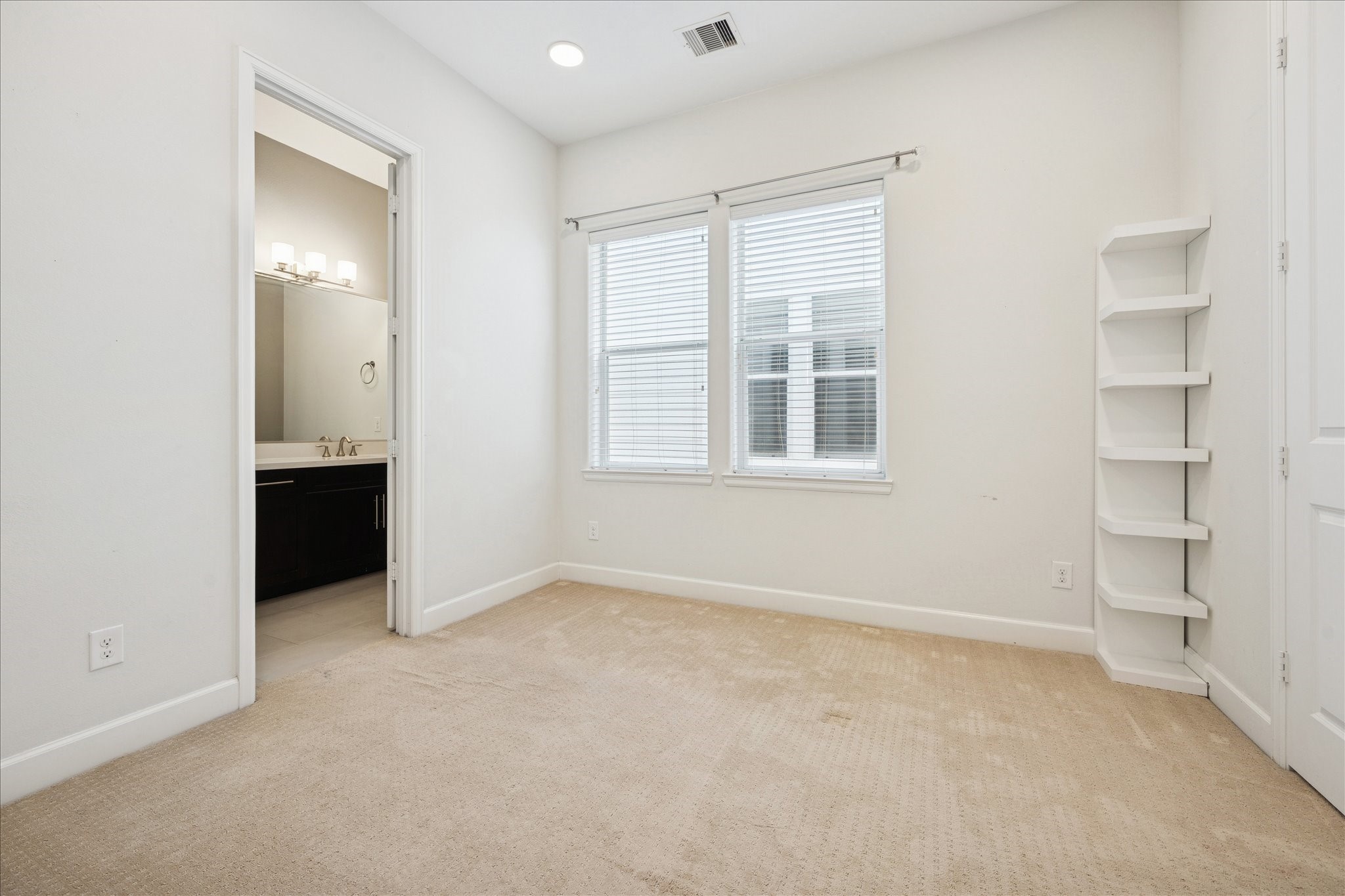 405 North Nagle Street, Unit B Houston, TX 77003 - Photo 14 of 24 an empty room with a empty space and windows