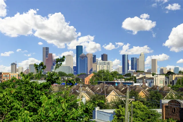 a view of a city with tall buildings