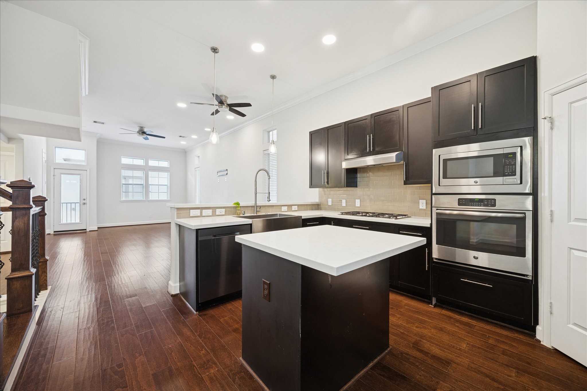 405 North Nagle Street, Unit B Houston, TX 77003 - Photo 6 of 24 a kitchen with a sink appliances and cabinets