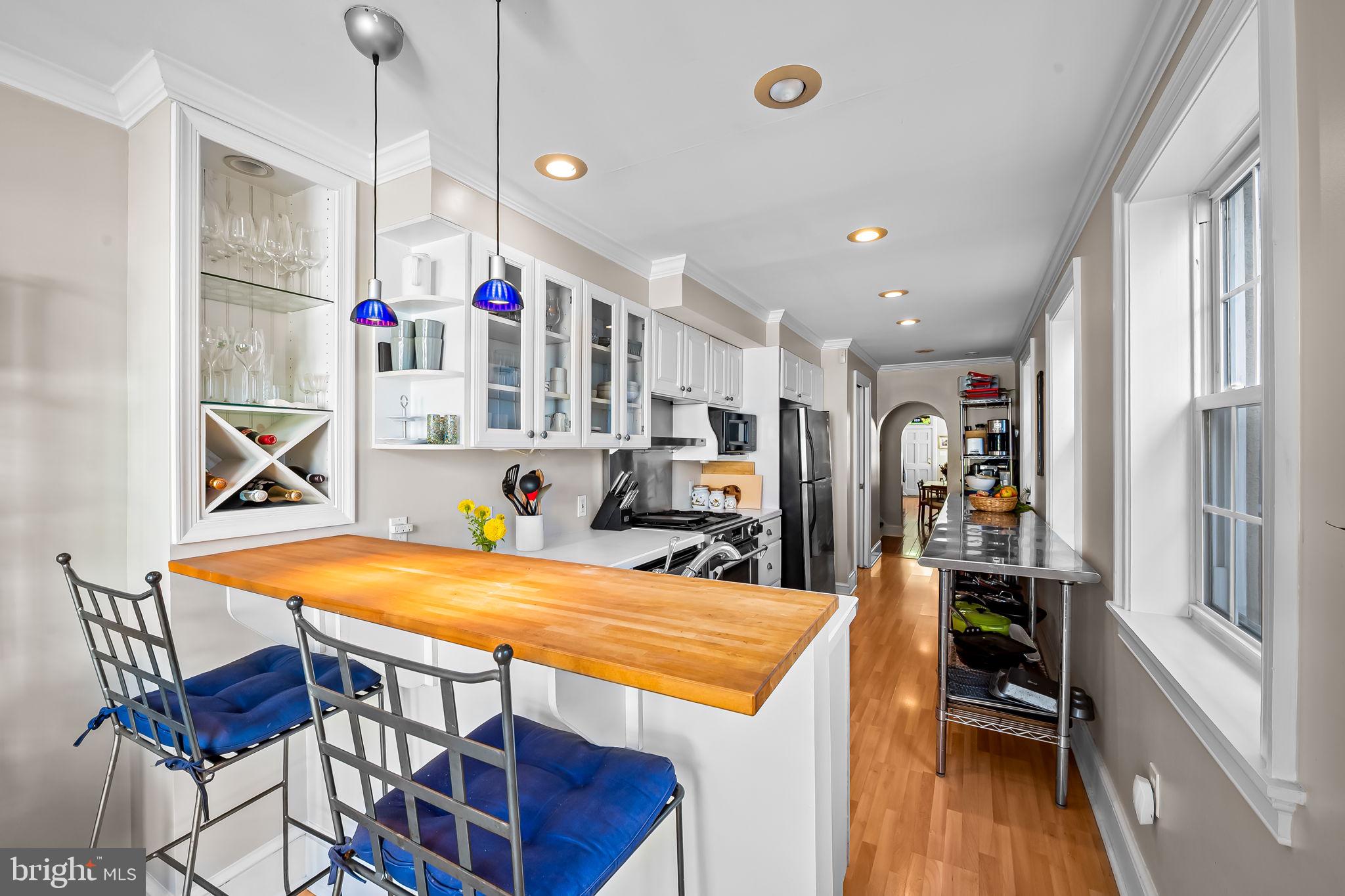 1908 Bank Street Baltimore, MD 21231 - Photo 17 of 37 a view of a dining room with furniture and wooden floor