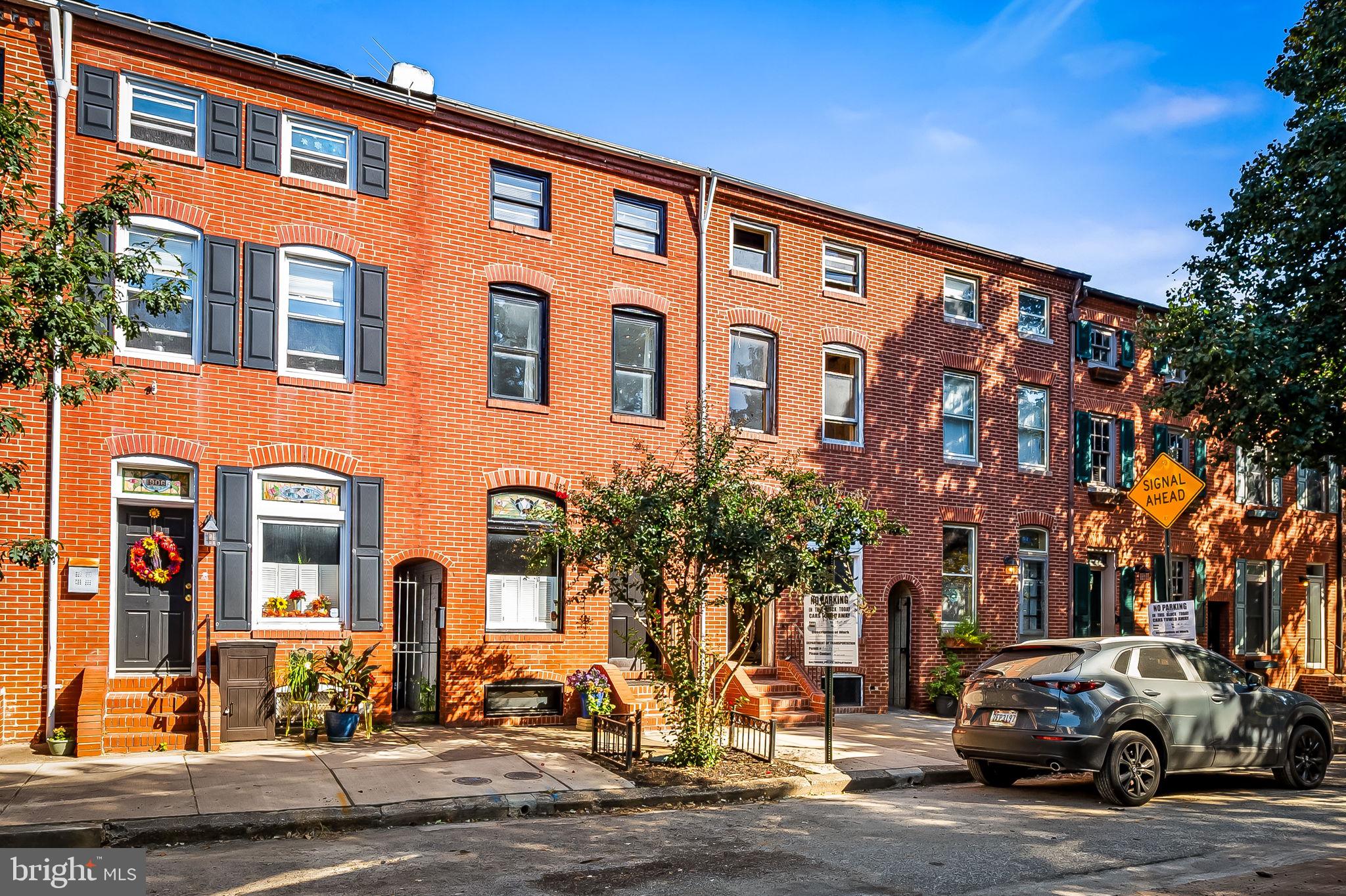 1908 Bank Street Baltimore, MD 21231 - Photo 3 of 37 a front view of a building with street view