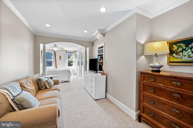 a view of a hallway with washer and dryer