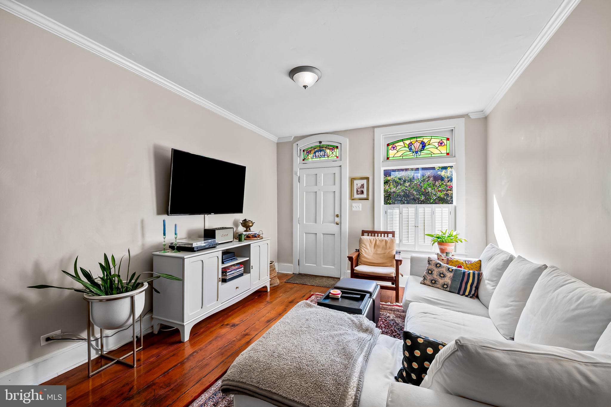 1908 Bank Street Baltimore, MD 21231 - Photo 6 of 37 a living room with furniture and a flat screen tv