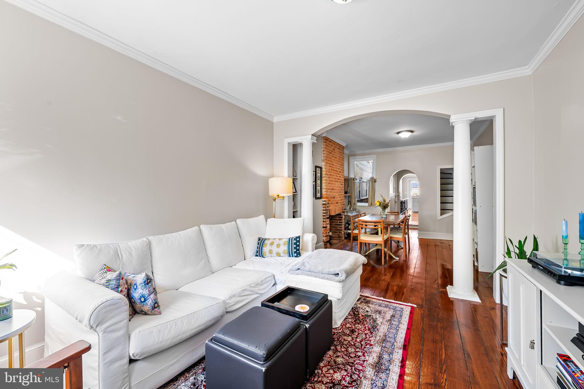 1908 Bank Street Baltimore, MD 21231 - Photo 7 of 37 a living room with furniture and wooden floor