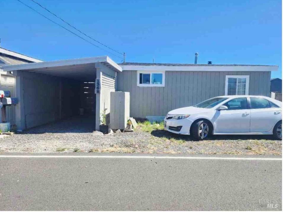 View of garage and front of the home facing the street.