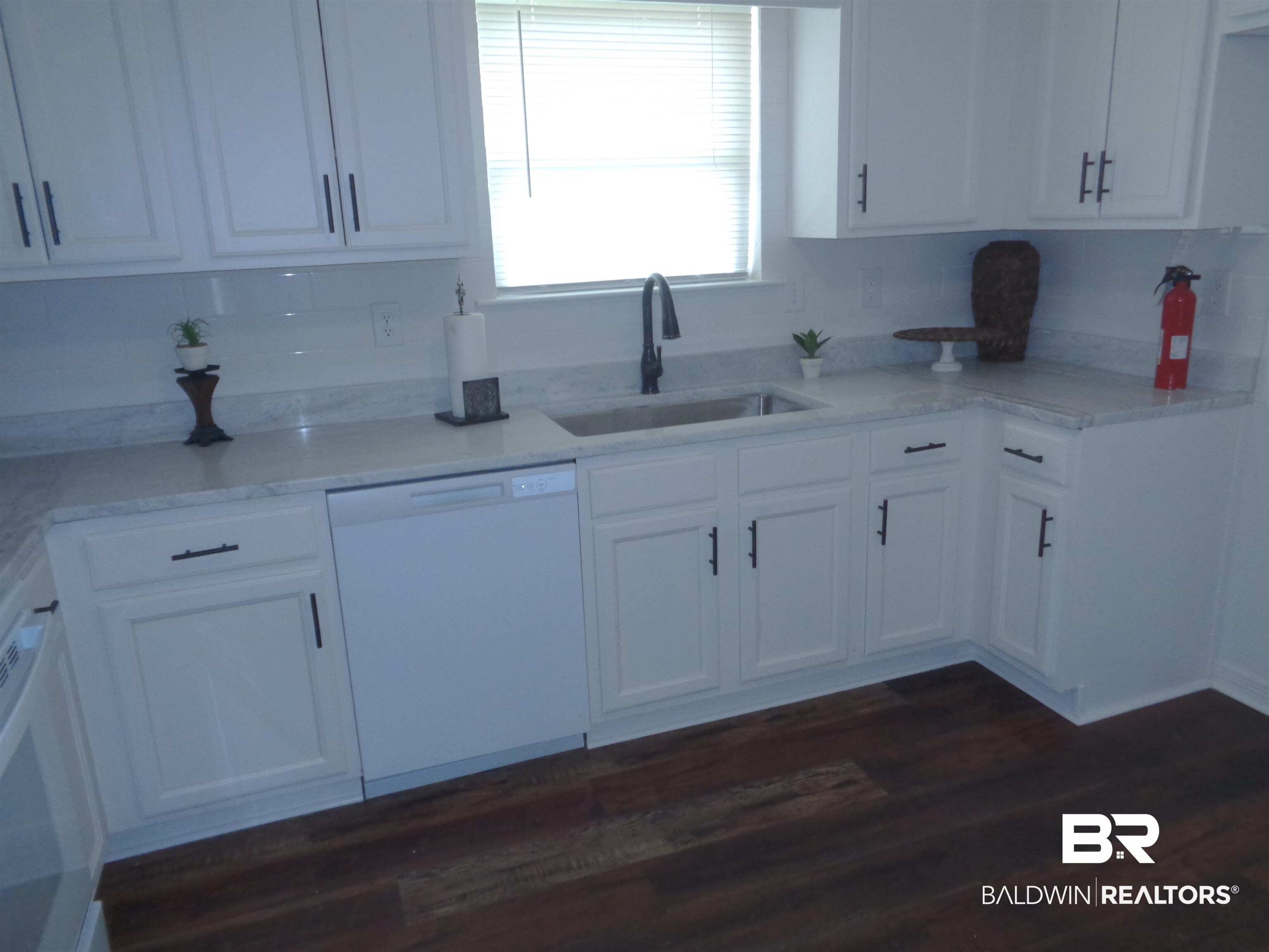 1557 Majesty Loop Foley, AL 36535 - Photo 7 of 25 New marble countertops. New deep SS sink.
