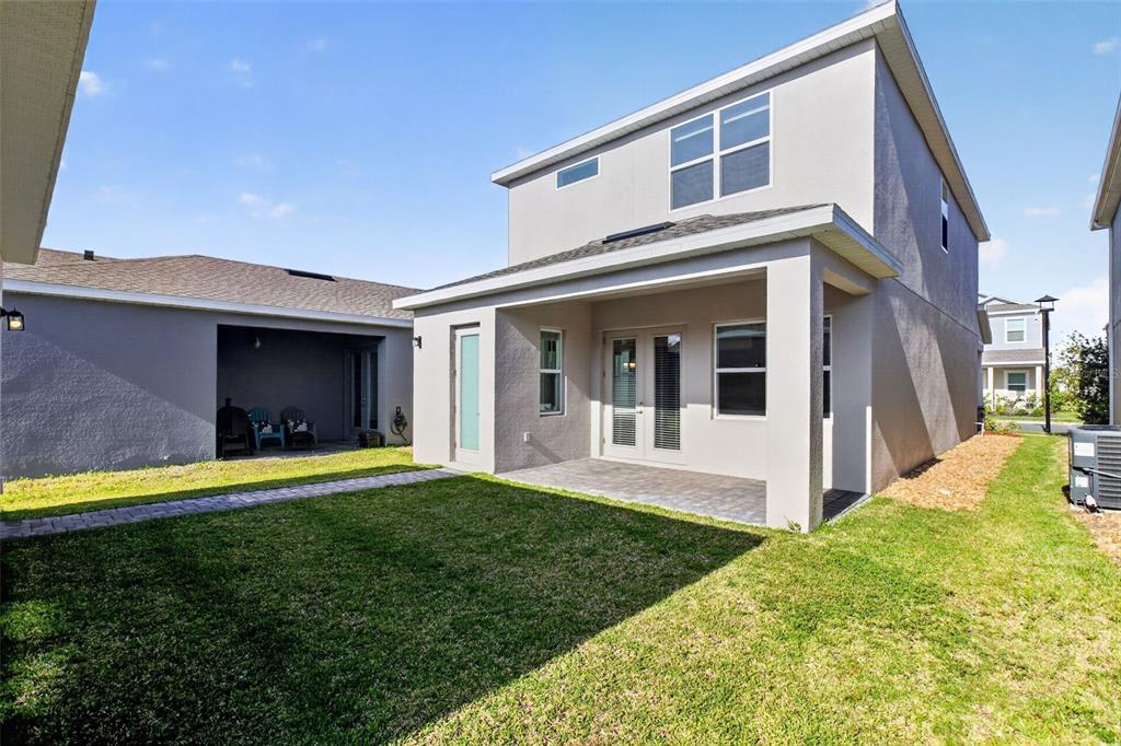 810 MIDDLETON Street DeBary, FL 32713 - Photo 51 of 52 a front view of a house with a yard