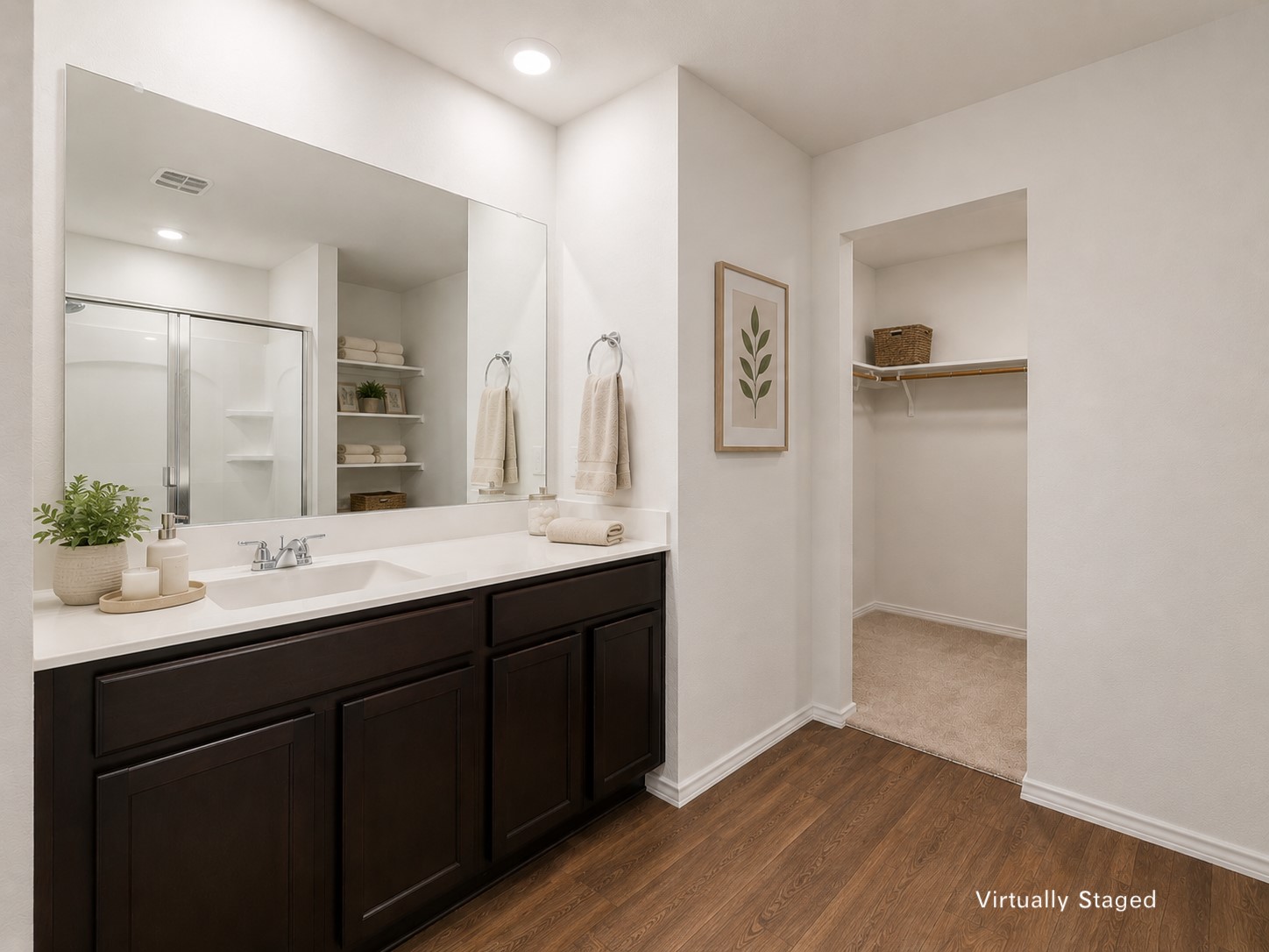 14917 Bajada Rd Manor Manor, TX 78653 - Photo 22 of 31 Full vanity with a single basin sink and dark wood-finish cabinetry