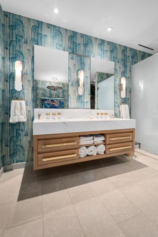 a view of a hallway with living room and furniture