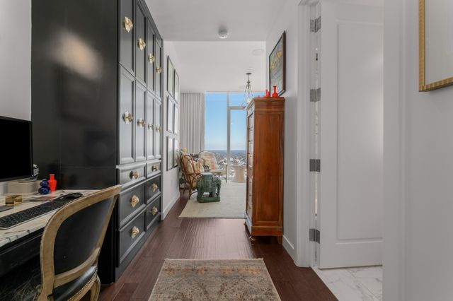 a bathroom with a sink a vanity and a mirror