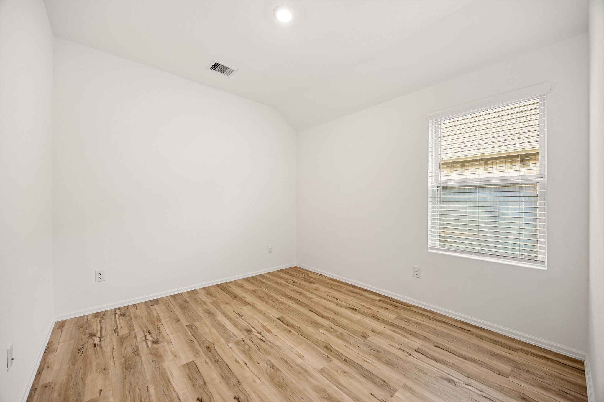 3014 Wedgewood Cove Way Porter, TX 77365 - Photo 20 of 24 a view of empty room with wooden floor