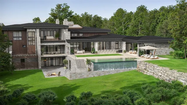 a house with swimming pool in front of it