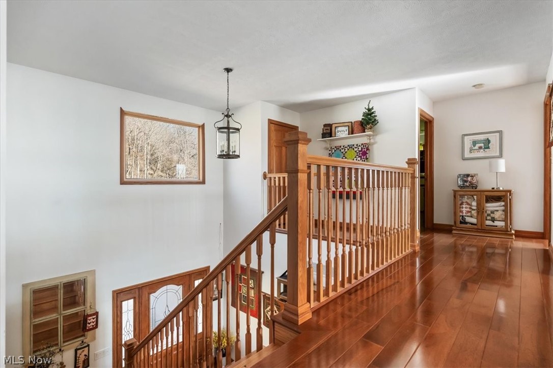 4280 Newbury Road Little Hocking, OH 45742 - Photo 21 of 41 Corridor with dark hardwood / wood-style flooring