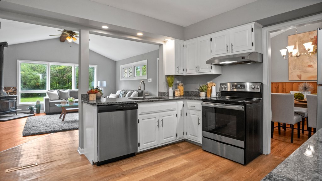 2803 Perry Road Flossmoor, IL 60422 - Photo 12 of 31 a kitchen with stainless steel appliances granite countertop a stove a sink and a refrigerator