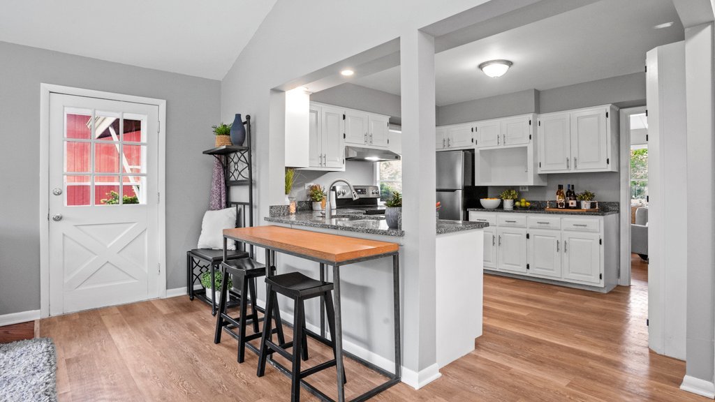 2803 Perry Road Flossmoor, IL 60422 - Photo 15 of 31 a kitchen with stainless steel appliances white cabinets and wooden floor