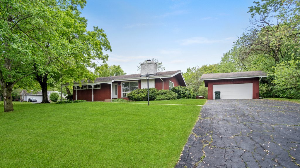 2803 Perry Road Flossmoor, IL 60422 - Photo 2 of 31 a front view of a house with a yard and trees