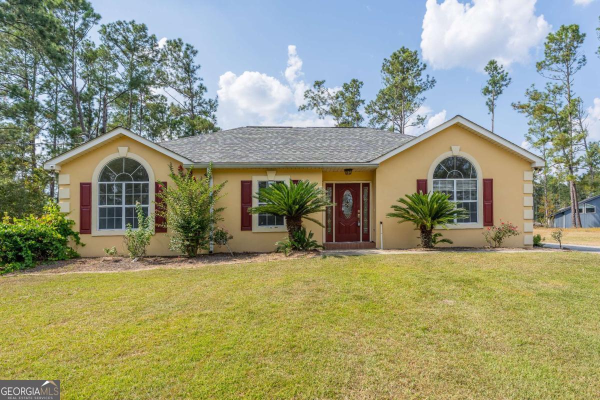 301 Ridge Lane Douglas, GA 31533 - Photo 1 of 26 a view of a house with a yard