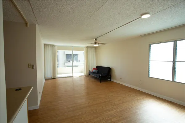 a view of livingroom and hardwood floor