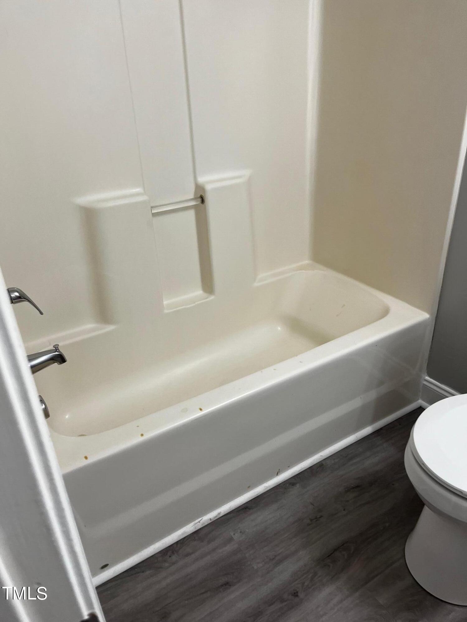 623 Rawls Drive Raleigh, NC 27610 - Photo 9 of 21 a bathroom with a sink and a toilet