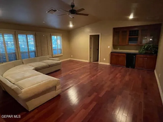 a view of kitchen with kitchen island microwave and stove