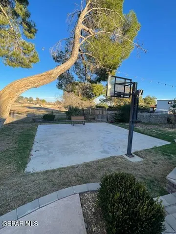 a view of a yard with an outdoor space