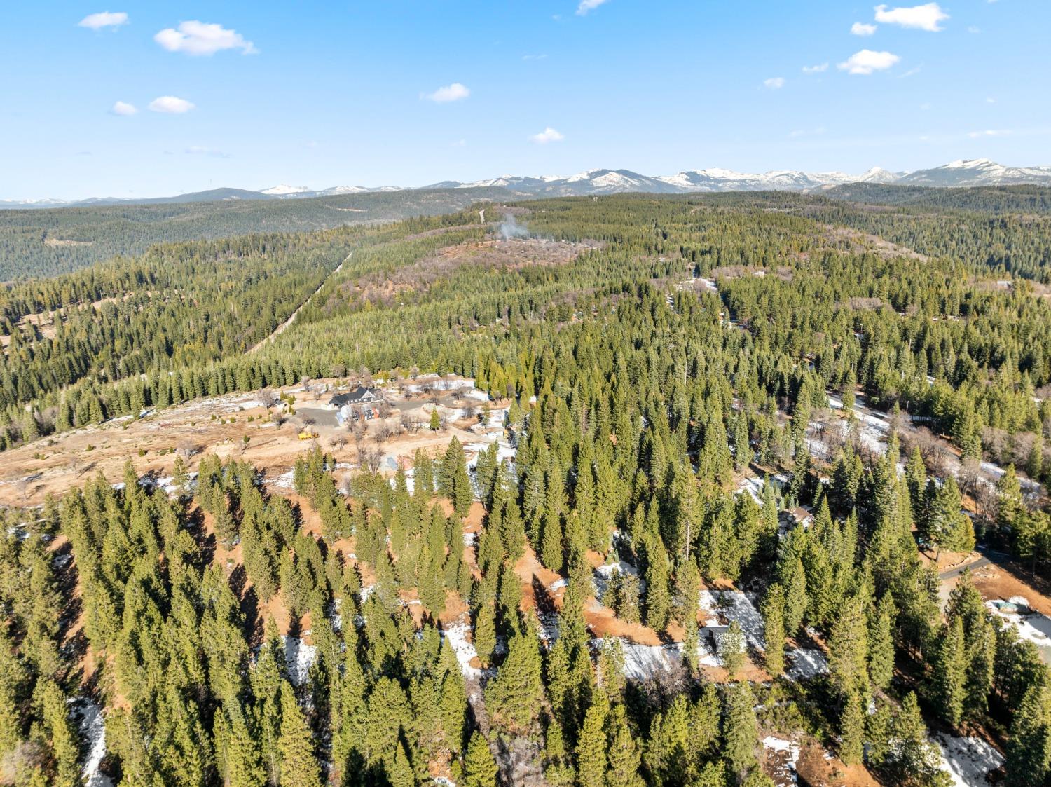 38787 Kearsarge Mill Road Alta, CA 95701 - Photo 6 of 16 a view of a city with mountains in the background