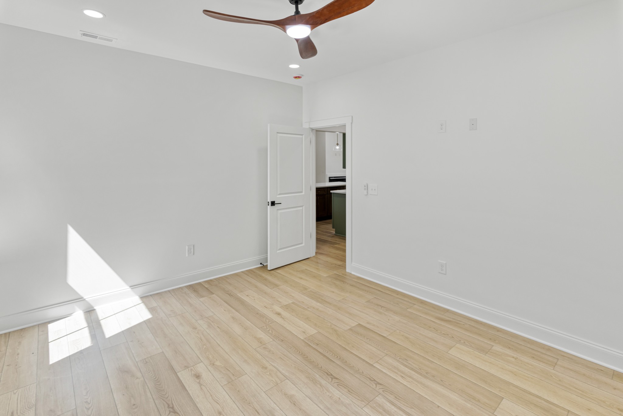 565 Shelton Road Manchester, TN 37355 - Photo 24 of 51 wooden floor in an empty room with a window