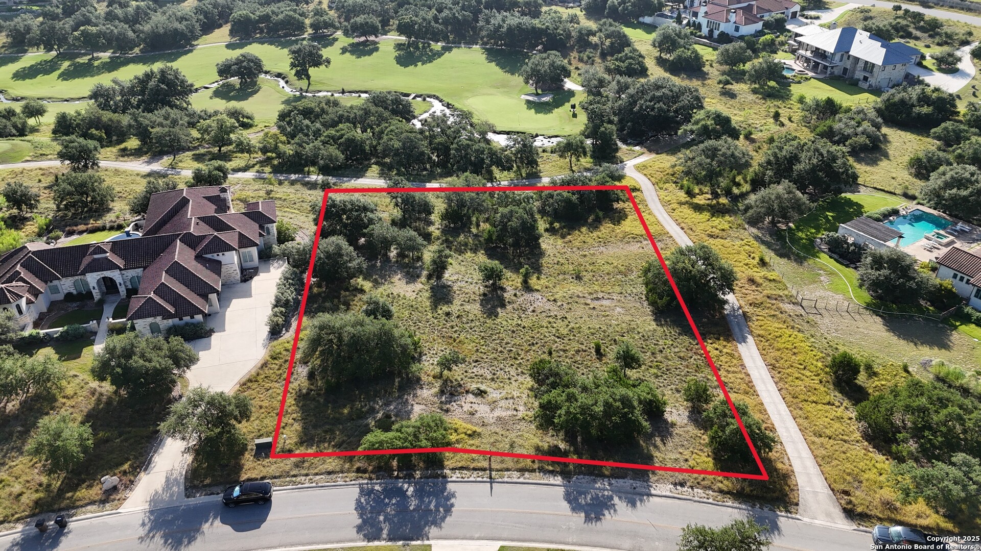 Lot 26 Winged Foot Boerne, TX 78006 - Photo 1 of 15 an aerial view of residential houses with outdoor space