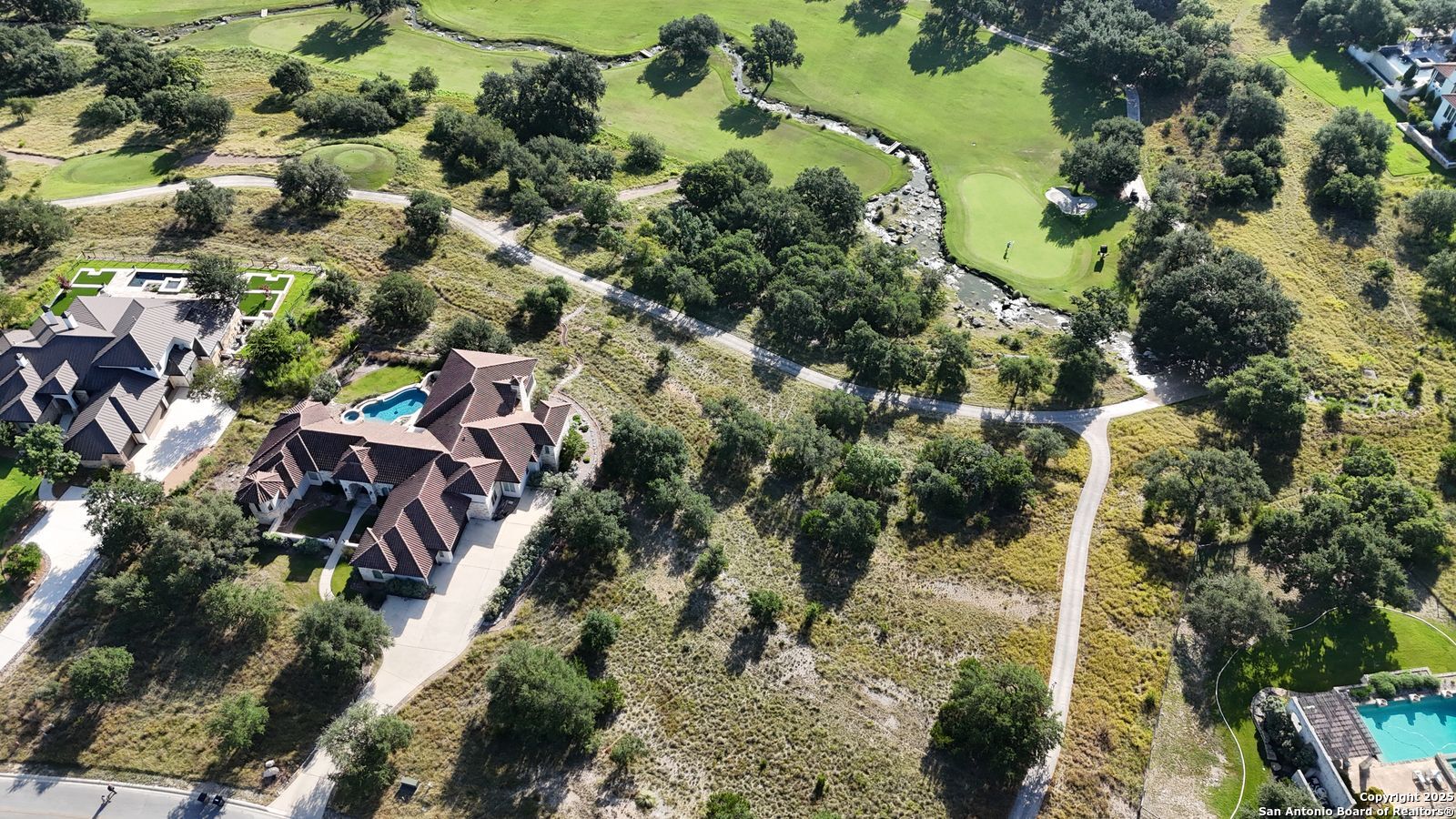 Lot 26 Winged Foot Boerne, TX 78006 - Photo 8 of 15 an aerial view of residential houses with outdoor space