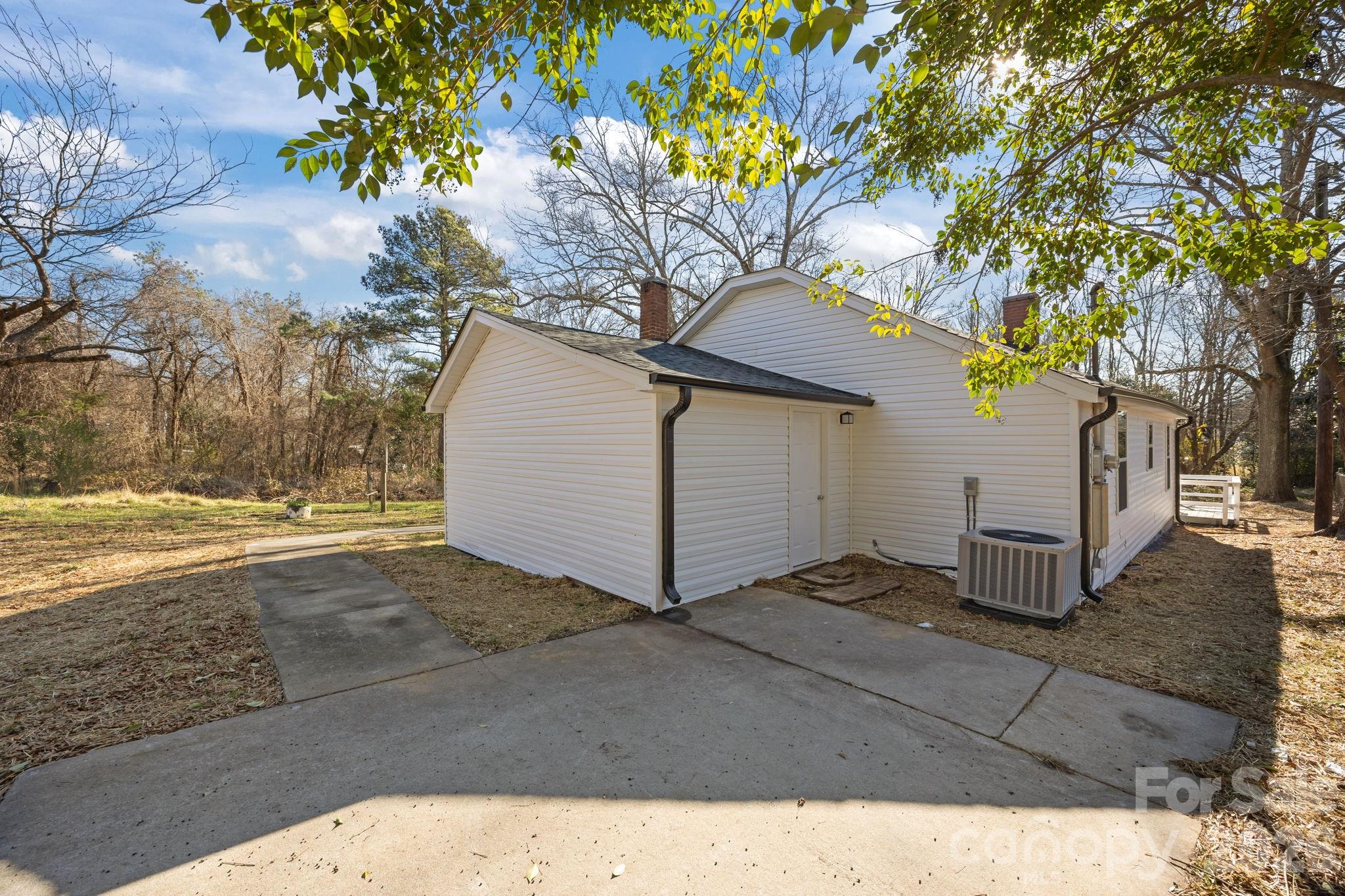 5010 Athens Street Kannapolis, NC 28081 - Photo 11 of 36 a view of a house with a yard