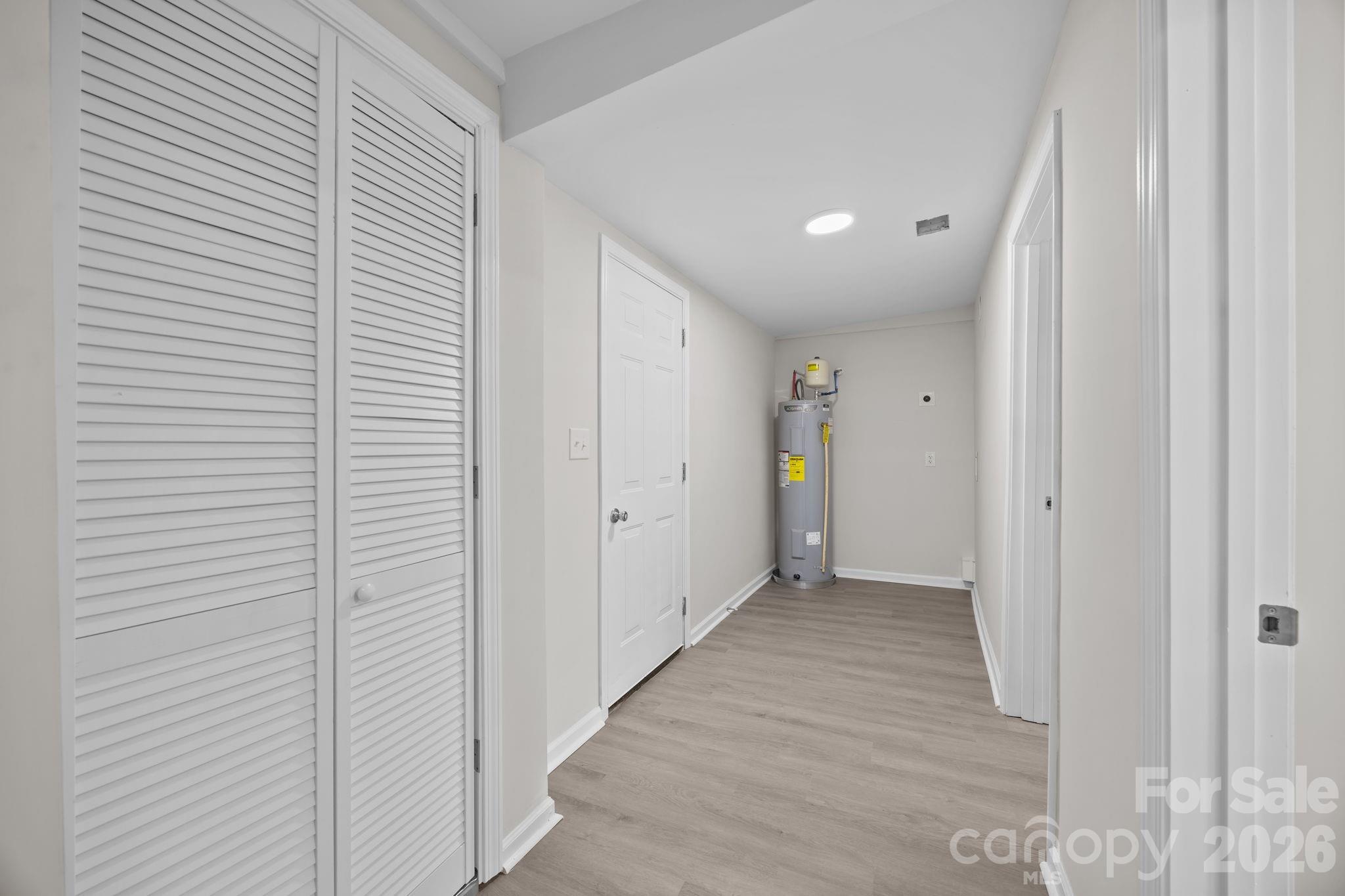 5010 Athens Street Kannapolis, NC 28081 - Photo 22 of 36 a view of hallway with wooden floor