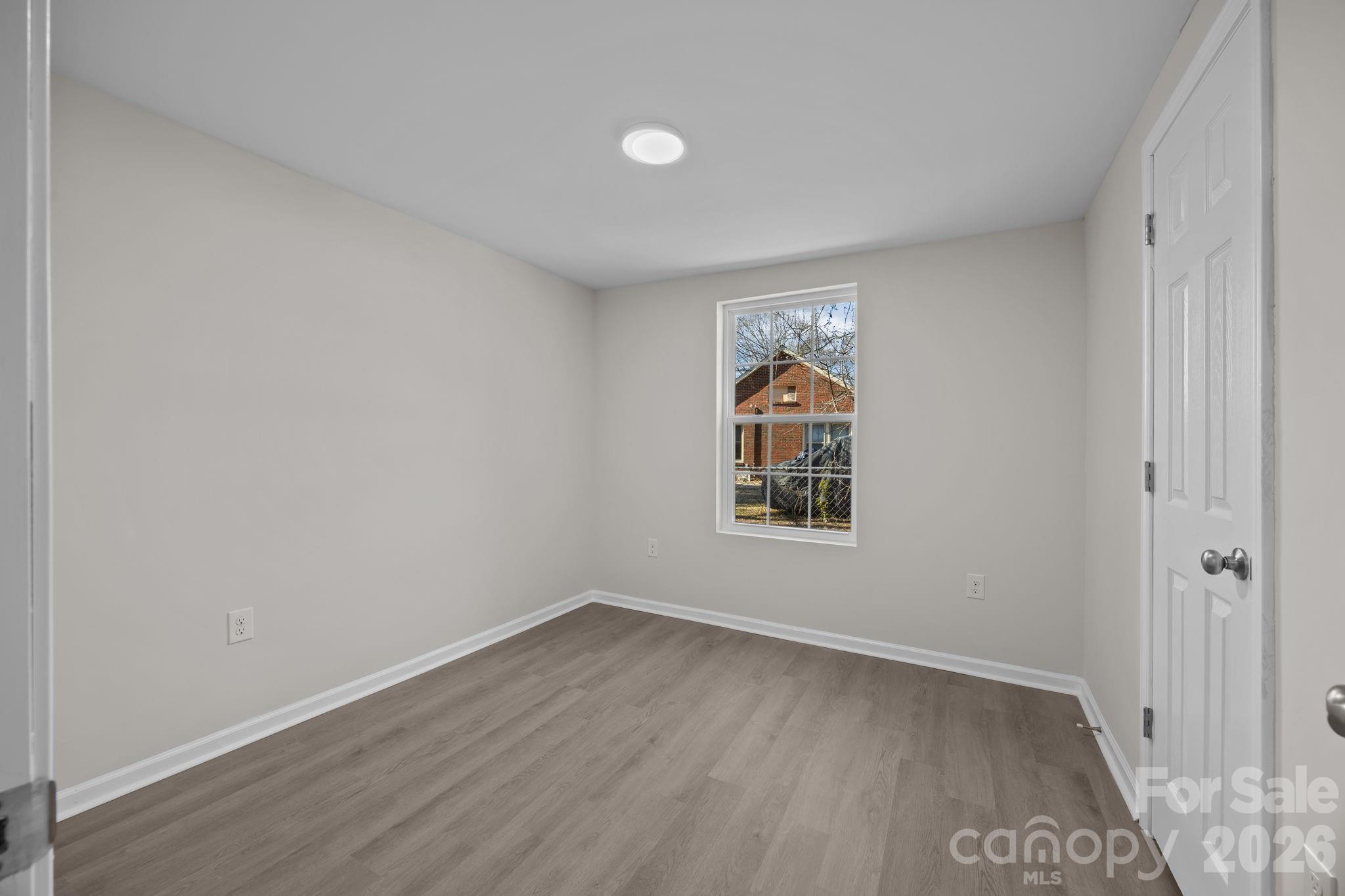 5010 Athens Street Kannapolis, NC 28081 - Photo 26 of 36 an empty room with a window