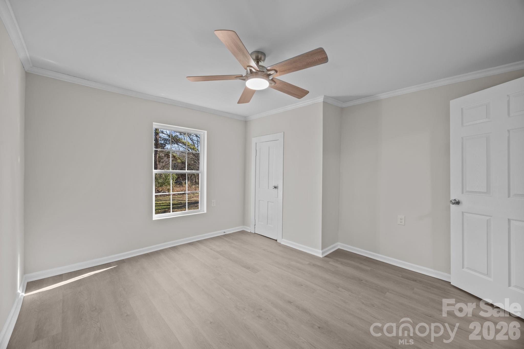 5010 Athens Street Kannapolis, NC 28081 - Photo 30 of 36 a view of an empty room with a window