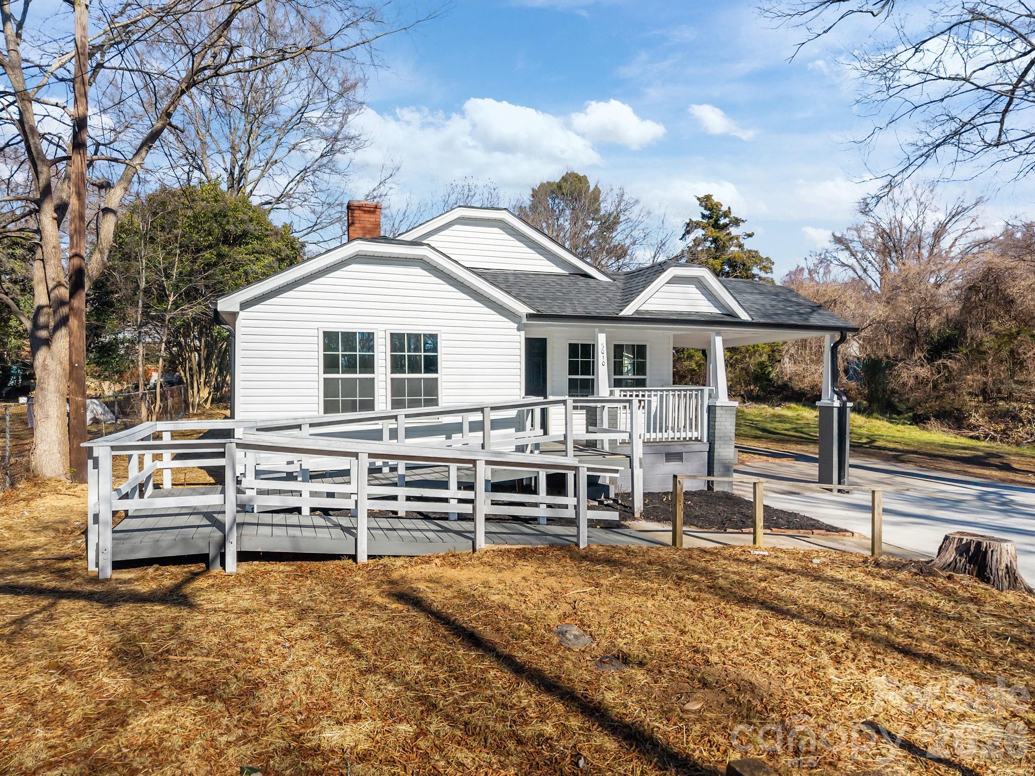 5010 Athens Street Kannapolis, NC 28081 - Photo 3 of 36 a front view of a house with a yard