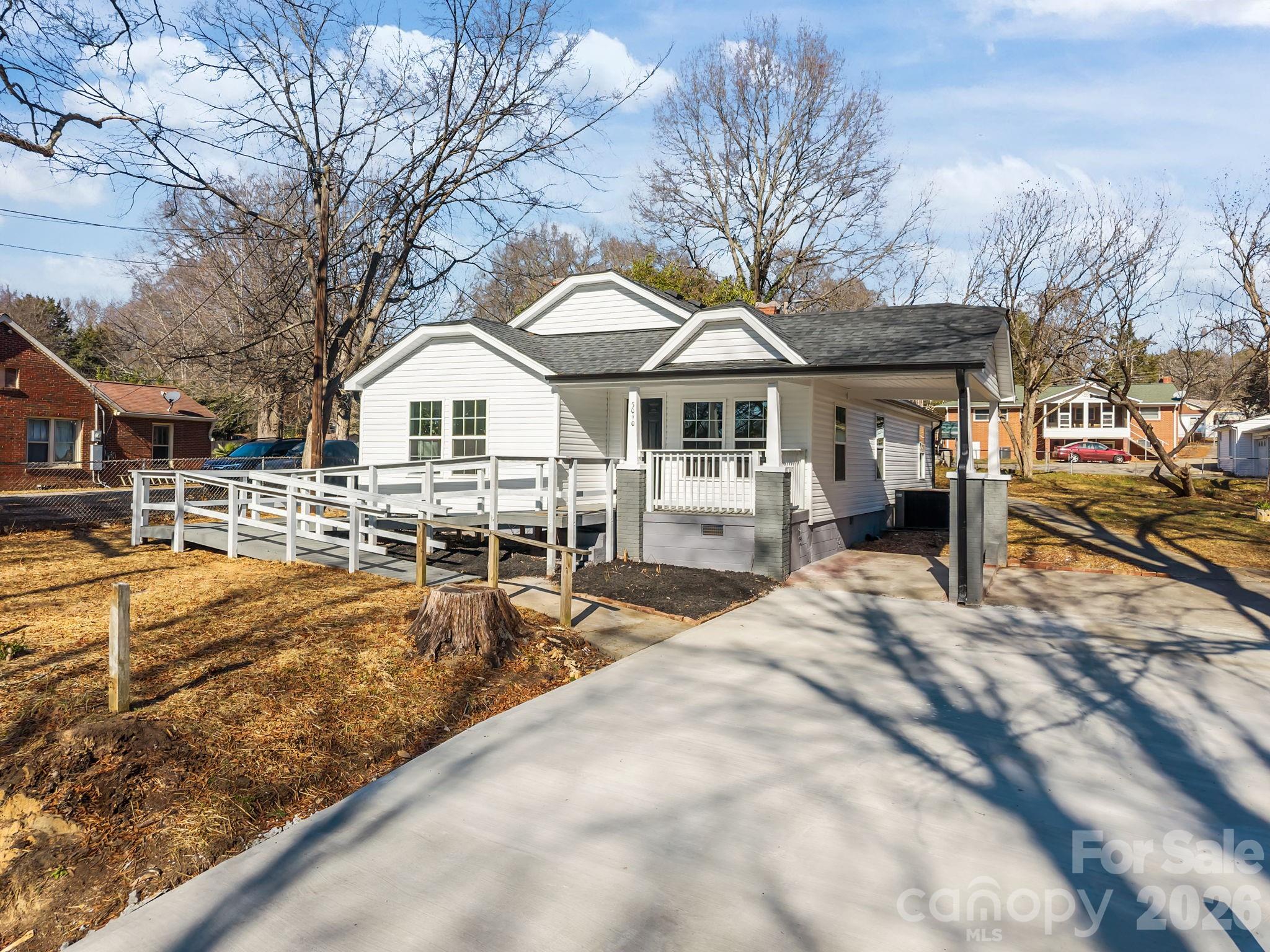 5010 Athens Street Kannapolis, NC 28081 - Photo 5 of 36 a front view of a house with swimming pool